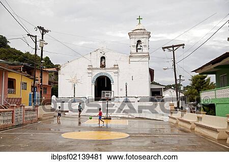 Children playing in front of a church on the island of Isla Taboga, Panama, Central America, North America View Large Photo Image Stock Image - Children playing in front of a church on the island of Isla Taboga, Panama, Central America, North America. Fotosearch