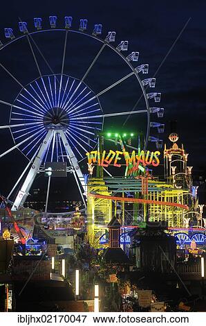 Stock Photo - Christmas market and fairground with Ferris wheel at the Alexa Shopping Center, Alexanderplatz Square, Berlin-Mitte, Berlin, Germany, Europe. Fotosearch