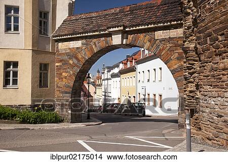 City walls, Donatstor Gate at Donatsturm tower, looking through Donatsgasse alley towards St. Nikolai Church, Freiberg, Erzgebirge, Ore Mountains, Saxony, Germany, Europe View Large Photo Image Picture - City walls, Donatstor Gate at Donatsturm tower, looking through Donatsgasse alley towards St. Nikolai Church, Freiberg, Erzgebirge, Ore Mountains, Saxony, Germany, Europe. Fotosearch