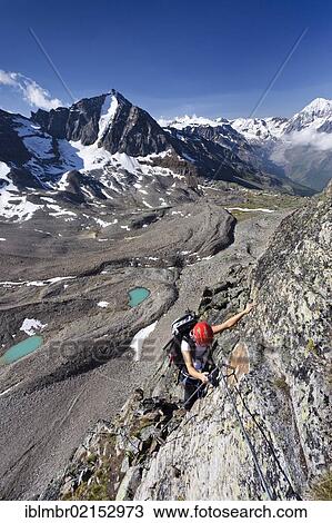 Climber ascending the climbing route to Tschenglser Hochwand above Duesseldorf Hut in Solda, looking towards Vertainspitze and Koenigsspitze Mountains, Solda Valley, Alto Adige, Italy, Europe View Large Photo Image Stock Image - Climber ascending the climbing route to Tschenglser Hochwand above Duesseldorf Hut in Solda, looking towards Vertainspitze and Koenigsspitze Mountains, Solda Valley, Alto Adige, Italy, Europe. Fotosearch
