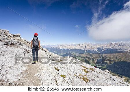 Climber climbing the Boeseekofel climbing route, with the Fanes Group and the Heiligkreuzkofel Group at the rear, Dolomites, Alto Adige, Italy, Europe View Large Photo Image Stock Photography - Climber climbing the Boeseekofel climbing route, with the Fanes Group and the Heiligkreuzkofel Group at the rear, Dolomites, Alto Adige, Italy, Europe. Fotosearch