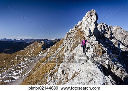 Climber on Bepi Zac climbing route in San Pellegrino Valley above San Pellegrino Pass, overlooking the Bervagabunden Hut, Dolomites, Trentino, Italy, Europe View Large Photo Image Stock Photo - Climber on Bepi Zac climbing route in San Pellegrino Valley above San Pellegrino Pass, overlooking the Bervagabunden Hut, Dolomites, Trentino, Italy, Europe. Fotosearch