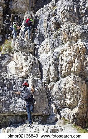Climbers climbing the Boeseekofel climbing route, Dolomites, Alto Adige, Italy, Europe View Large Photo Image Stock Photo - Climbers climbing the Boeseekofel climbing route, Dolomites, Alto Adige, Italy, Europe. Fotosearch
