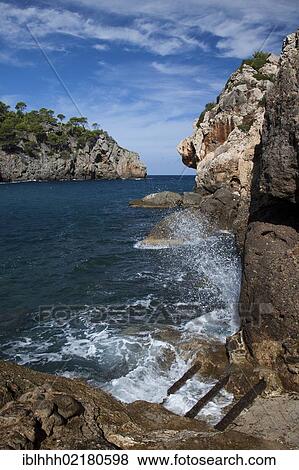 Coast, Cala Deia, Majorca, Balearic Islands, Spain, Europe View Large Photo Image Stock Photo - Coast, Cala Deia, Majorca, Balearic Islands, Spain, Europe. Fotosearch