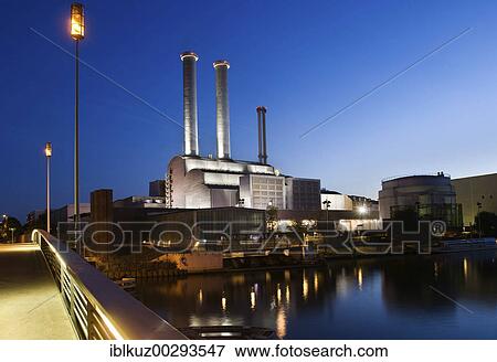 Stock Photo - Cogenerating power station Mitte, Powerstation of Vattenfall, evening, Berlin, Germany.. Fotosearch