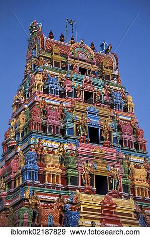 Colourful Hindu temple tower or Gopura, near Karaikudi, Chettinad, Tamil Nadu, South India, India, Asia View Large Photo Image Stock Photo - Colourful Hindu temple tower or Gopura, near Karaikudi, Chettinad, Tamil Nadu, South India, India, Asia. Fotosearch