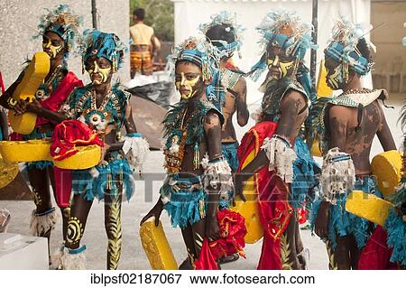 Colourfully painted actors in traditional costume at the Dinagyang Folk Festival in the Cultural Centre of the Philippines, Manila, Philippines, Asia View Large Photo Image Stock Photo - Colourfully painted actors in traditional costume at the Dinagyang Folk Festival in the Cultural Centre of the Philippines, Manila, Philippines, Asia. Fotosearch