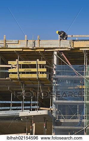Construction industry, workers with boarding on top of a building site, Bonn, North Rhine-Westphalia, Germany, Europe, PublicGround, Europe View Large Photo Image Stock Photograph - Construction industry, workers with boarding on top of a building site, Bonn, North Rhine-Westphalia, Germany, Europe, PublicGround, Europe. Fotosearch