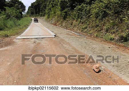 Construction of a tarmac road, Koh Lanta, Thailand, Asia View Large Photo Image Stock Image - Construction of a tarmac road, Koh Lanta, Thailand, Asia. Fotosearch