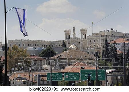 Contrast, Pontifical Institute Notre Dame of Jerusalem, near the Christian Quarter in the Old City and the Israeli flag in the foreground, Jerusalem, Israel, Middle East, Asia View Large Photo Image Stock Photography - Contrast, Pontifical Institute Notre Dame of Jerusalem, near the Christian Quarter in the Old City and the Israeli flag in the foreground, Jerusalem, Israel, Middle East, Asia. Fotosearch