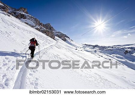 Cross-country skier ascending Zendleser Kofel Mountain in the Villnoess Valley above Zanser Alm alpine pasture, Alto Adige, Italy, Europe View Large Photo Image Stock Image - Cross-country skier ascending Zendleser Kofel Mountain in the Villnoess Valley above Zanser Alm alpine pasture, Alto Adige, Italy, Europe. Fotosearch