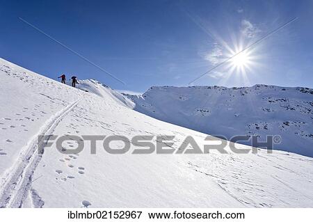 Cross-country skiers ascending Hoertlahner Mountain above Durnholz, Sarntal Valley, Alto Adige, Italy, Europe View Large Photo Image Stock Photo - Cross-country skiers ascending Hoertlahner Mountain above Durnholz, Sarntal Valley, Alto Adige, Italy, Europe. Fotosearch