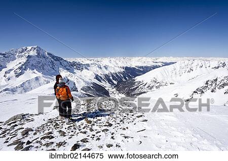 Cross-country skiers on the summit of Hintere Schoentaufspitze Mountain, Solda, with Ortler Mountain and the Solda Valley at the rear, Alto Adige, Italy, Europe View Large Photo Image Stock Photography - Cross-country skiers on the summit of Hintere Schoentaufspitze Mountain, Solda, with Ortler Mountain and the Solda Valley at the rear, Alto Adige, Italy, Europe. Fotosearch