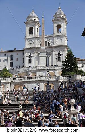 Crowds of tourists sitting on the Spanish Steps and the Santissima Trinità dei Monti, Rome, Lazio, Italy, Europe View Large Photo Image Stock Image - Crowds of tourists sitting on the Spanish Steps and the Santissima Trinità dei Monti, Rome, Lazio, Italy, Europe. Fotosearch