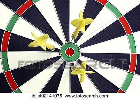 Darts, throwing game, darts narrowly off the middle of the dartboard, the bullseye View Large Photo Image Stock Photography - Darts, throwing game, darts narrowly off the middle of the dartboard, the bullseye. Fotosearch
