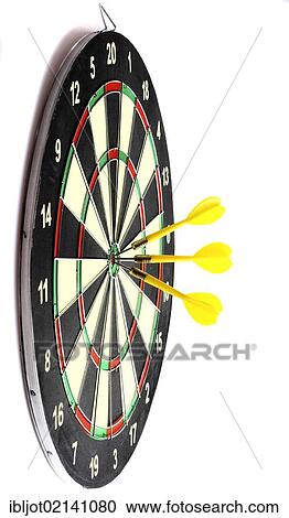 Stock Image - Darts, throwing game, darts sticking into the middle of the dartboard, the bullseye. Fotosearch