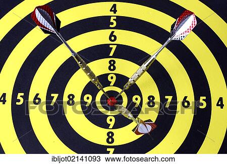 Darts, throwing game, darts sticking into the middle of the dartboard, the bullseye View Large Photo Image Stock Image - Darts, throwing game, darts sticking into the middle of the dartboard, the bullseye. Fotosearch