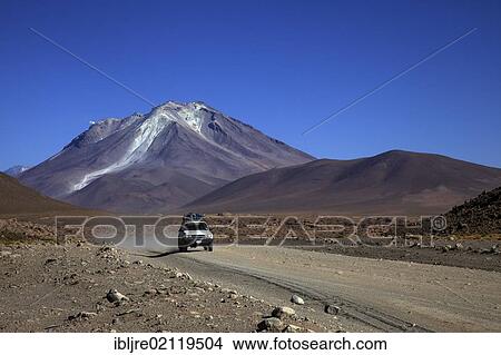 Dirt track, Altiplano, Ollague volcano, 5869 m, southern Bolivia, South America View Large Photo Image Picture - Dirt track, Altiplano, Ollague volcano, 5869 m, southern Bolivia, South America. Fotosearch