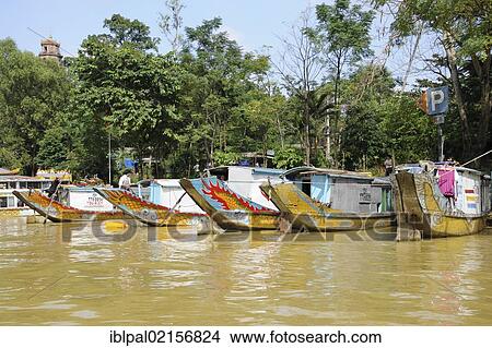 Picture - Dragon boats on the Perfume River, Hue, Vietnam, Southeast Asia, Asia. Fotosearch
