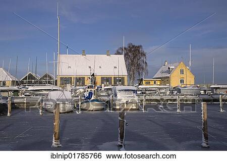 Dragor harbour, covered in snow and ice, Denmark, Europe View Large Photo Image Stock Photograph - Dragor harbour, covered in snow and ice, Denmark, Europe. Fotosearch