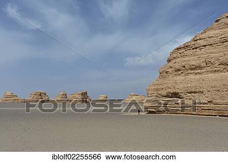 Dry desert landscape with rock formations, historic Silk Road, Yumen Pass, Yadan National Park, Gansu, China, Asia View Large Photo Image Stock Photograph - Dry desert landscape with rock formations, historic Silk Road, Yumen Pass, Yadan National Park, Gansu, China, Asia. Fotosearch