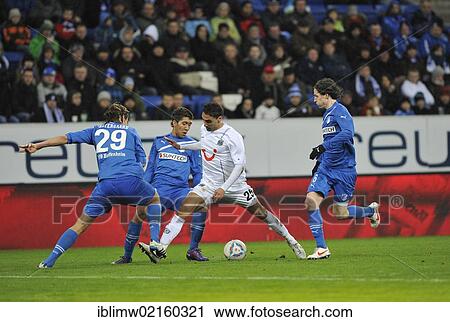 Duel of one against three, from left, Jannik Vestergaard, TSG 1899 Hoffenheim, Roberto Firmino, TSG 1899 Hoffenheim, Mohammed Abdellaoue, Hannover 96, Sebastian Rudy, TSG 1899 Hoffenheim, action, Wirsol Rhein-Neckar-Arena, Sinsheim Hoffenheim... View Large Photo Image Stock Image - Duel of one against three, from left, Jannik Vestergaard, TSG 1899 Hoffenheim, Roberto Firmino, TSG 1899 Hoffenheim, Mohammed Abdellaoue, Hannover 96, Sebastian Rudy, TSG 1899 Hoffenheim, action, Wirsol Rhein-Neckar-Arena, Sinsheim Hoffenheim.... Fotosearch