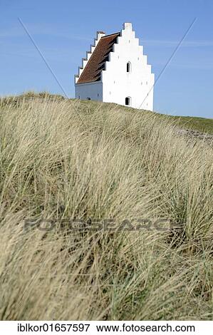 Stock Photo - Dunes with the tower of the sand-engulfed Buried Church, Skagen, Jutland, Denmark, Europe. Fotosearch