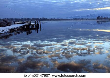 Early morning at lake Chiemsee, Chiemgau, Upper Bavaria, Germany, Europe View Large Photo Image Stock Photo - Early morning at lake Chiemsee, Chiemgau, Upper Bavaria, Germany, Europe. Fotosearch