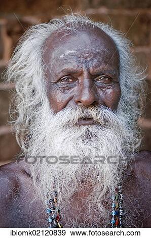Stock Photo - Elderly sadhu man with a white beard and hair, Karaikudi, Tamil Nadu, South India, India, Asia. Fotosearch