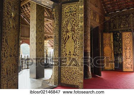 Entrance door ornamented with gold reliefs, Wat Xieng Thong temple, Luang Prabang, Laos, Indochina, Asia View Large Photo Image Stock Photo - Entrance door ornamented with gold reliefs, Wat Xieng Thong temple, Luang Prabang, Laos, Indochina, Asia. Fotosearch