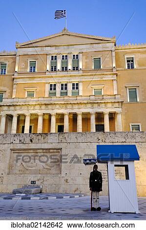 Stock Image - Evzone guard in front of the Grave of the Unknown Soldier at Syntagma Square in Athens, Greece, Europe. Fotosearch