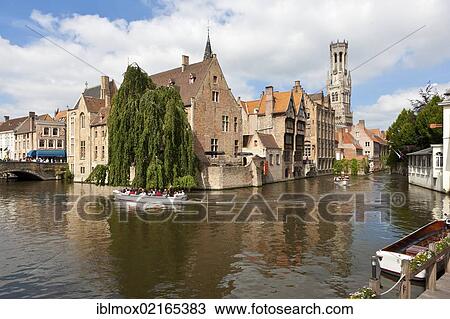 Excursion boat with tourists at the Historical Centre with guild houses on Rozenhoedkaai, Quay of the Rosary, historic city centre of Bruges, UNESCO World Heritage Site, West Flanders, Flemish Region, Belgium, Europe View Large Photo Image Stock Image - Excursion boat with tourists at the Historical Centre with guild houses on Rozenhoedkaai, Quay of the Rosary, historic city centre of Bruges, UNESCO World Heritage Site, West Flanders, Flemish Region, Belgium, Europe. Fotosearch
