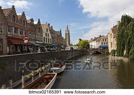 Excursion boat with tourists at the Historical Centre with guild houses on Rozenhoedkaai, Quay of the Rosary, historic city centre of Bruges, UNESCO World Heritage Site, West Flanders, Flemish Region, Belgium, Europe View Large Photo Image Stock Image - Excursion boat with tourists at the Historical Centre with guild houses on Rozenhoedkaai, Quay of the Rosary, historic city centre of Bruges, UNESCO World Heritage Site, West Flanders, Flemish Region, Belgium, Europe. Fotosearch