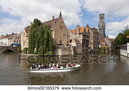 Excursion boat with tourists at the Historical Centre with guild houses on Rozenhoedkaai, Quay of the Rosary, historic city centre of Bruges, UNESCO World Heritage Site, West Flanders, Flemish Region, Belgium, Europe View Large Photo Image Stock Photo - Excursion boat with tourists at the Historical Centre with guild houses on Rozenhoedkaai, Quay of the Rosary, historic city centre of Bruges, UNESCO World Heritage Site, West Flanders, Flemish Region, Belgium, Europe. Fotosearch