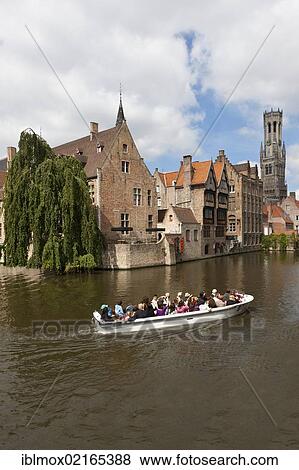 Excursion boat with tourists at the Historical Centre with guild houses on Rozenhoedkaai, Quay of the Rosary, historic city centre of Bruges, UNESCO World Heritage Site, West Flanders, Flemish Region, Belgium, Europe View Large Photo Image Stock Photo - Excursion boat with tourists at the Historical Centre with guild houses on Rozenhoedkaai, Quay of the Rosary, historic city centre of Bruges, UNESCO World Heritage Site, West Flanders, Flemish Region, Belgium, Europe. Fotosearch