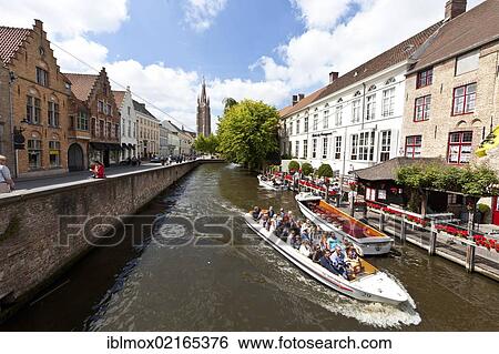 Excursion boat with tourists at the Historical Centre with guild houses on Rozenhoedkaai, Quay of the Rosary, historic city centre of Bruges, UNESCO World Heritage Site, West Flanders, Flemish Region, Belgium, Europe View Large Photo Image Stock Photograph - Excursion boat with tourists at the Historical Centre with guild houses on Rozenhoedkaai, Quay of the Rosary, historic city centre of Bruges, UNESCO World Heritage Site, West Flanders, Flemish Region, Belgium, Europe. Fotosearch