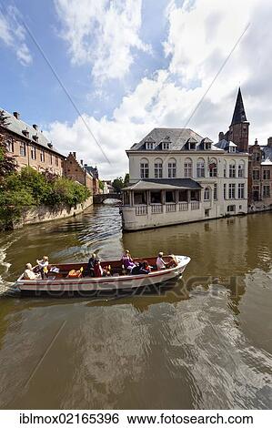 Excursion boat with tourists at the Historical Centre with guild houses on Rozenhoedkaai, Quay of the Rosary, historic city centre of Bruges, UNESCO World Heritage Site, West Flanders, Flemish Region, Belgium, Europe View Large Photo Image Stock Photograph - Excursion boat with tourists at the Historical Centre with guild houses on Rozenhoedkaai, Quay of the Rosary, historic city centre of Bruges, UNESCO World Heritage Site, West Flanders, Flemish Region, Belgium, Europe. Fotosearch