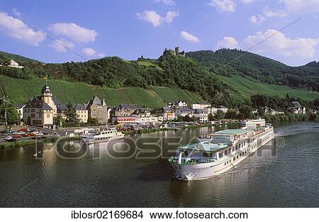 Excursion ship on the Moselle river, town of Bernkastel-Kues at back, Rhineland-Palatinate, Germany, Europe View Large Photo Image Picture - Excursion ship on the Moselle river, town of Bernkastel-Kues at back, Rhineland-Palatinate, Germany, Europe. Fotosearch