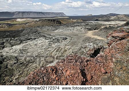 Picture - Extinct crater, lava fields and coloured lava in the geothermal area of the Leirhnjukur fissure at the Krafla volcano, north Iceland, Iceland, Europe. Fotosearch