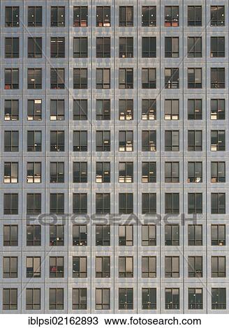 Stock Image - Facade of 50-storey Canary Wharf Tower skyscraper at One Canada Square, designed by Cesar Pelli and completed in 1991, London Docklands, England, United Kingdom, Europe. Fotosearch