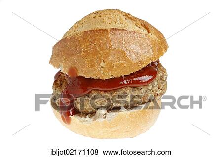 Fast food, bread roll with a meat patty and ketschup View Large Photo Image Stock Photo - Fast food, bread roll with a meat patty and ketschup. Fotosearch