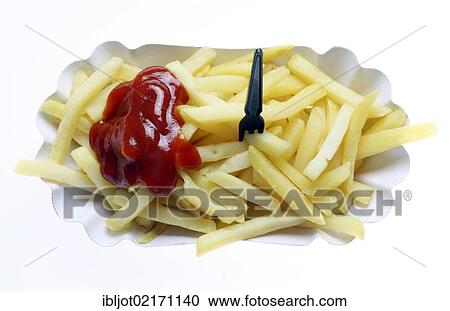 Fast food, French fries on a paper plate with ketchup View Large Photo Image Stock Image - Fast food, French fries on a paper plate with ketchup. Fotosearch