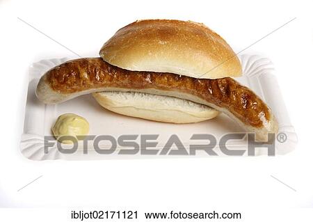 Stock Image - Fast food, grilled sausage in a bun with mustard. Fotosearch