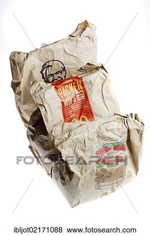 Stock Photo - Fast-food meals from various snack food chains in packaging to take-away, Burger King, McDonalds, Kentucky Fried Chicken. Fotosearch