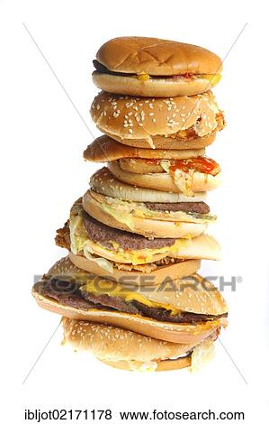 Fast food, stacked hamburgers, cheeseburgers, chickenburgers, vegetable burgers, fish burgers View Large Photo Image Stock Photo - Fast food, stacked hamburgers, cheeseburgers, chickenburgers, vegetable burgers, fish burgers. Fotosearch