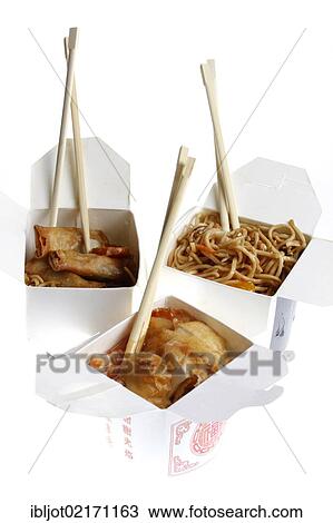 Stock Image - Fast food, various Asian dishes, noodles, spring rolls and sweet and sour chicken on rice, packaged, with chopsticks. Fotosearch