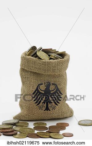Federal eagle image on money bag filled with euro coins, coins in front of it, symbolic image for Germany's prosperity View Large Photo Image Stock Photography - Federal eagle image on money bag filled with euro coins, coins in front of it, symbolic image for Germany's prosperity. Fotosearch