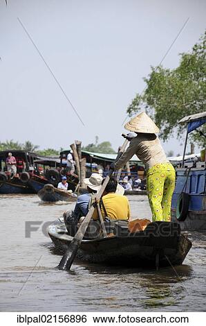 Female rower, row boat tour on a river, My Tho, Vietnam, Southeast Asia, Asia View Large Photo Image Stock Photograph - Female rower, row boat tour on a river, My Tho, Vietnam, Southeast Asia, Asia. Fotosearch