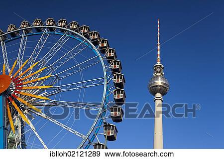 Fernsehturm television tower and Ferris wheel against a blue sky, Berlin, Germany, Europe, PublicGround, Europe View Large Photo Image Stock Photo - Fernsehturm television tower and Ferris wheel against a blue sky, Berlin, Germany, Europe, PublicGround, Europe. Fotosearch
