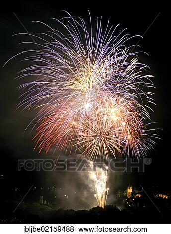 Stock Photo - Fireworks in the night, Fuenfknopfturm, Five-Button-Tower, Kaufbeuern, Allgaeu, Germany, Europe. Fotosearch